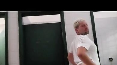 Hot babe flaunts axil in public bathroom, looking for a man to fuck her hard