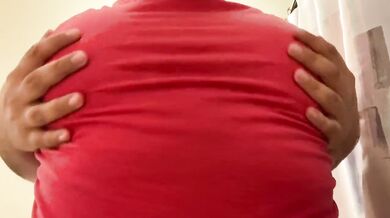 Get up close and personal with a chubby amateur's hairy man boobs in her shirt