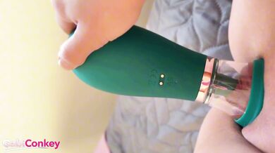 Watch this young babe moan and play with her vibrator in solo orgasm frenzy