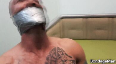 Victor tied up and tapegagged by Peter | preview
